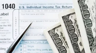 ¿Quién es elegible para el reembolso de $900 del IRS y cómo reclamarlo?