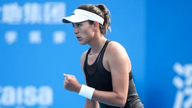 Muguruza, a cuartos de final en dobles